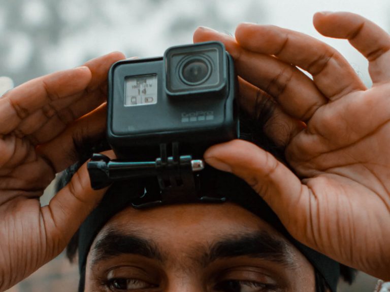 To capture close passes and dangerous driving, a man fits an action camera gopro to record video