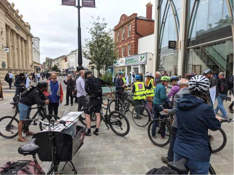 A group of cyclists gather for a ride through Cheltenham as part of Clean Air Day