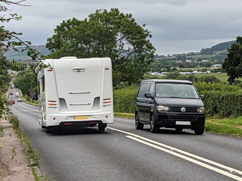 A photo of vehicles passing on the A435 near Cheltenham Racecourse. The Cheltenham to Bishop's Cleeve Cycle route would provide an alternative to this road.