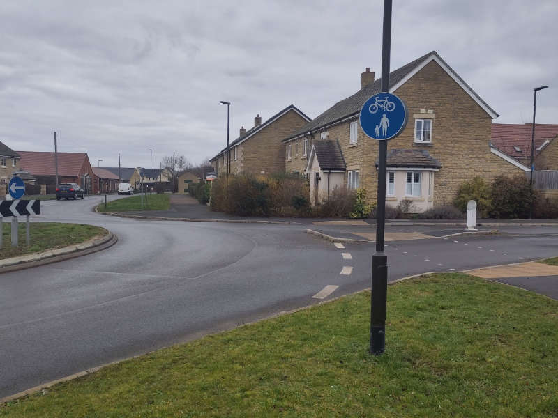 The Bishops Cleeve LCWIP will only establish areas, and there is a need for quality. The image shows a shared path interrupted by roundabouts.