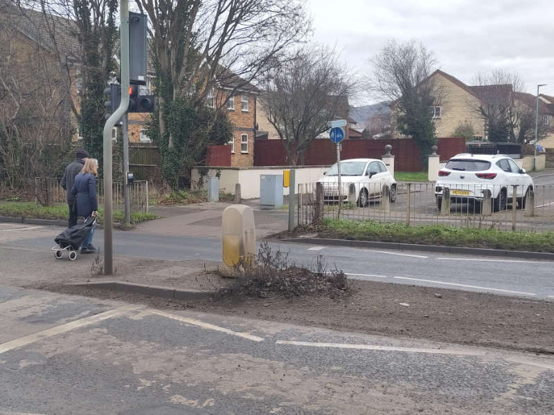 The popular crossing into Stoke Road to access Bishop's Cleeve from the West that is frequently blocked by vehicles due to design issues, lack of markings and poor enforcement.